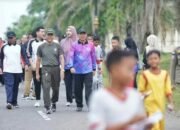 Dalam Semarakan HUT OI Ke 22 Tahun, Ratusan Peserta Ikuti Jalan Santai